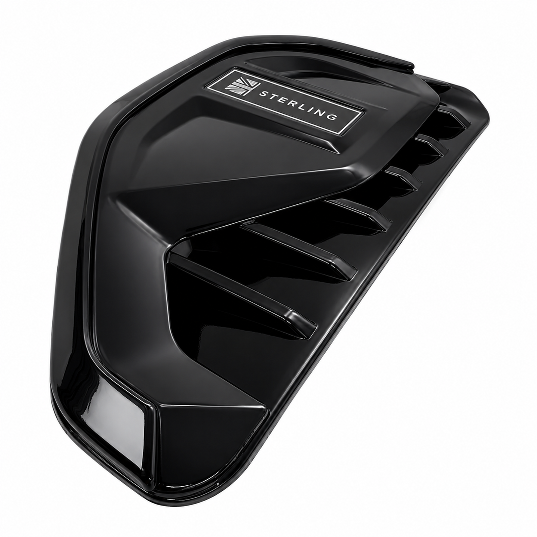 A glossy black molded plastic engine cover with a silver and black Sterling logo on the top, shown on a plain white background.