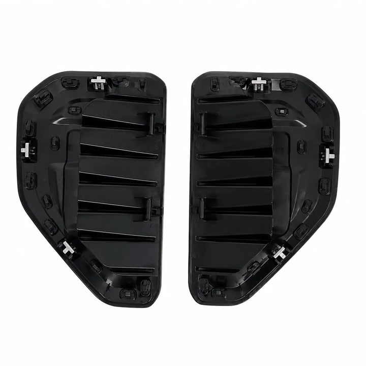 A pair of black plastic automotive side marker light housings, showing both the front and back views with mounting clips, isolated on a white background.