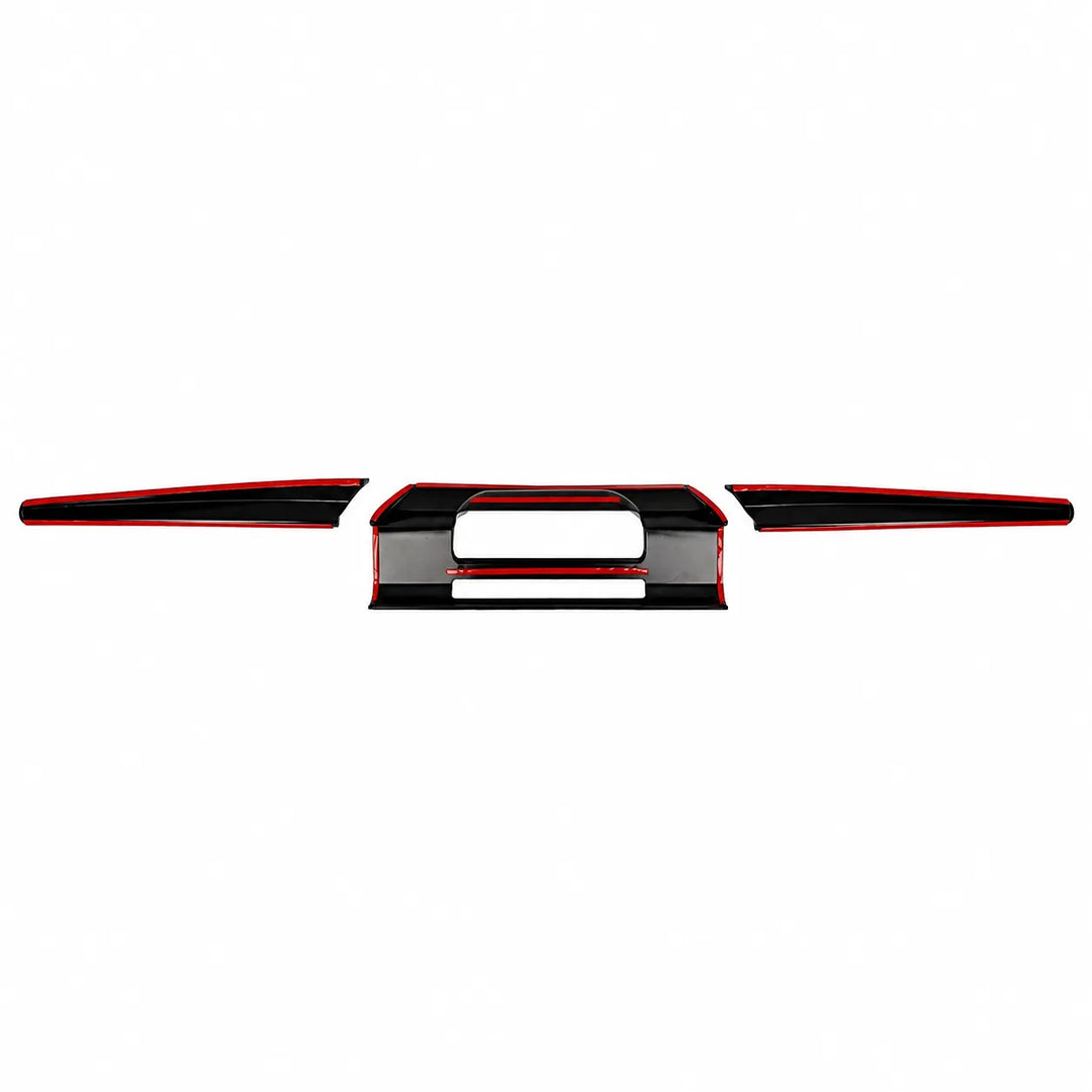 A set of glossy black dashboard trim pieces with red accent lines, arranged symmetrically on a plain white background.