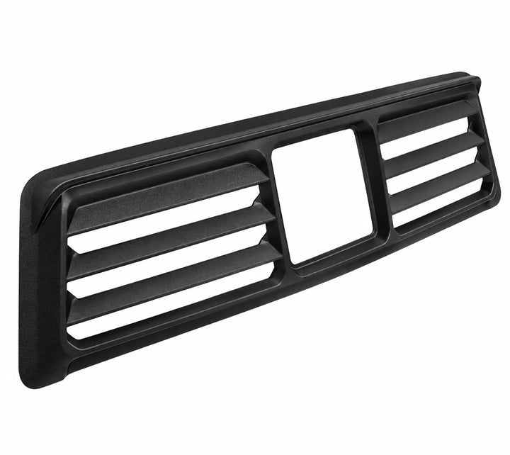 A black plastic vehicle grille trim piece with slotted vents and a central square cutout, shown on a plain white background.