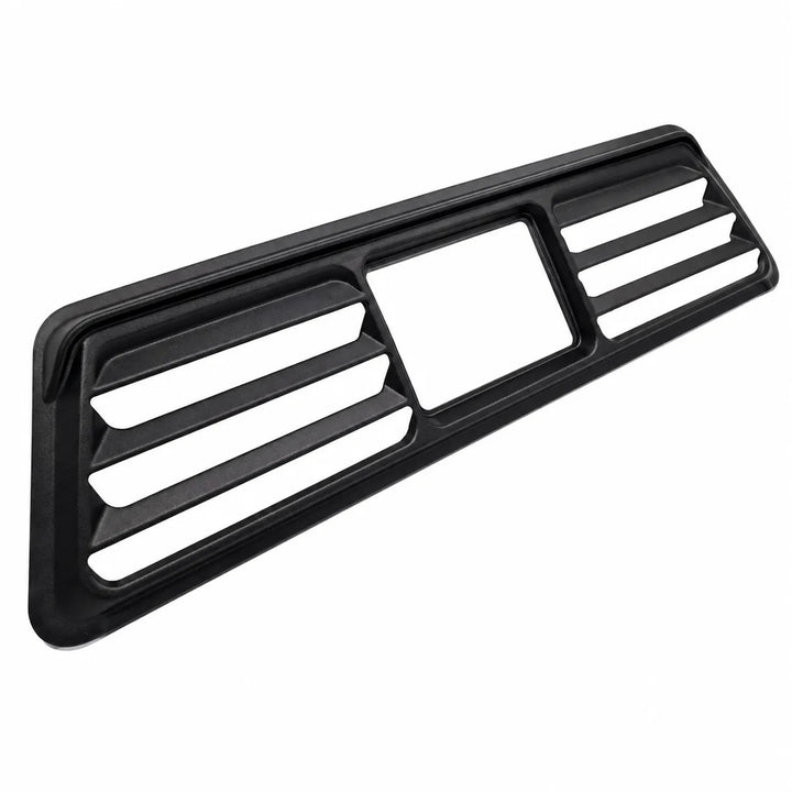 A black plastic dashboard vent trim piece with slotted louvers and a central rectangular opening, shown on a plain white background.