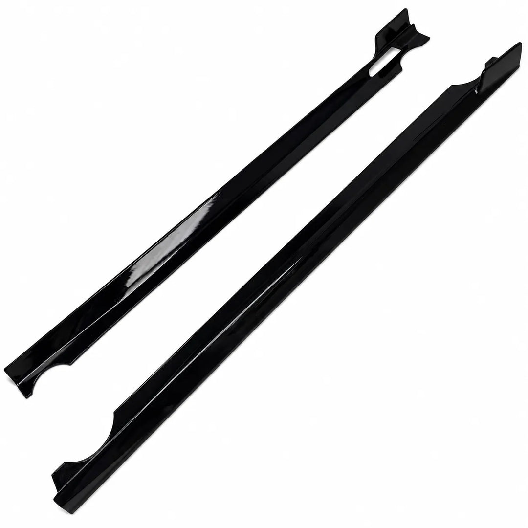 A pair of glossy black automotive trim pieces, Black door sill trims or body moulding, shown diagonally against a plain white background.