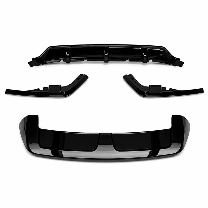 A set of glossy black automotive body trim pieces, rear diffuser valance, two shorter curved pieces, and a larger lower trim piece, with gloss black spoiler displayed on a clean white background.