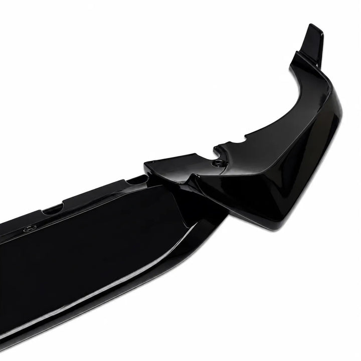 A glossy black automotive body panel, likely a fender or bumper section, shown on a clean white background.