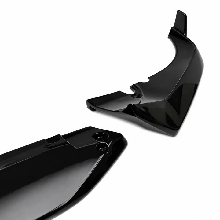 Two glossy black plastic splitter body shown on a clean white background.
