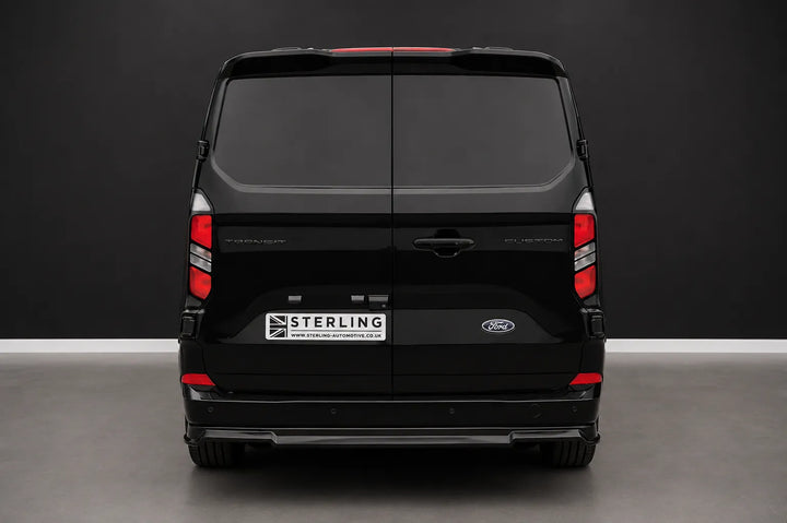 A rear Sterling customized Ford Transit van with rear diffuser splitter, photographed in a studio setting.