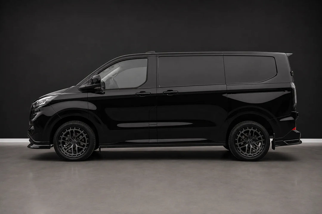 A side image of a Sterling customized Ford Transit van with a custom front grille and lip spoiler, featuring multi-spoke dark wheels and tinted windows, photographed in a studio setting.