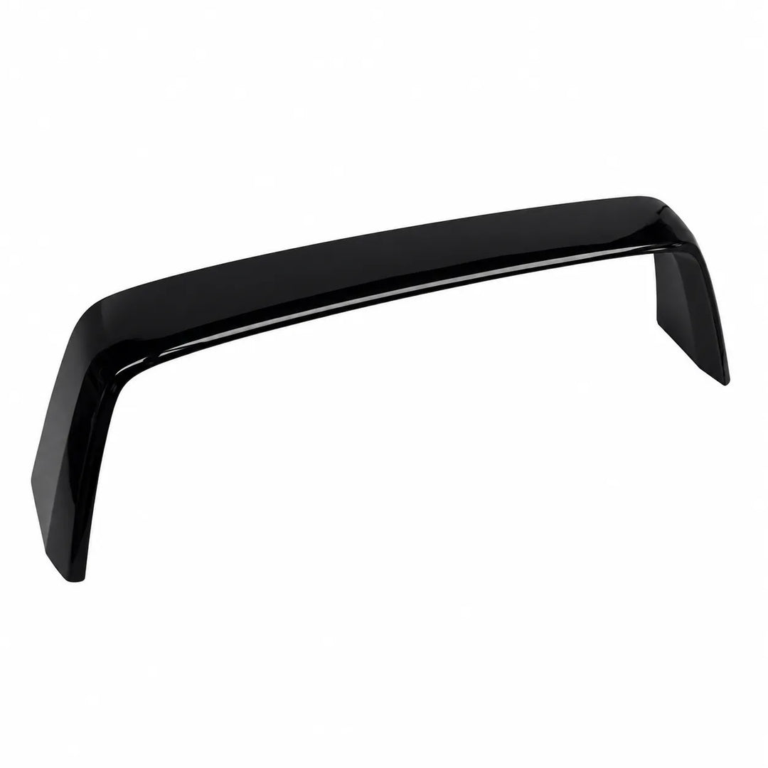 A glossy black automotive spoiler or trunk lid trim piece, shown from a three-quarters angle on a solid white background.